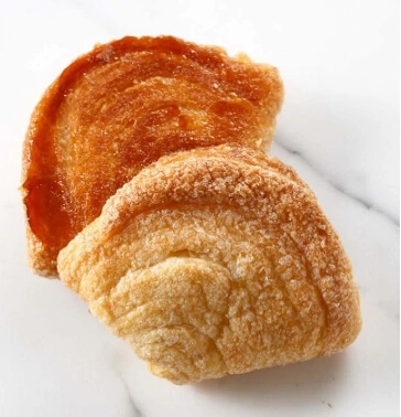 It’s time to bake your bichons to perfection! Preheat your oven to the right temperature and place the tray of filled bichons inside, making sure there’s enough space around each pastry to allow for even puffing and browning.