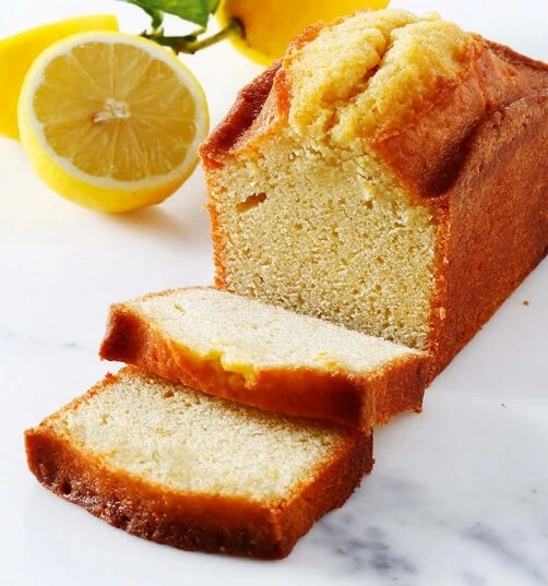 A slice of Earl Grey cake with citrus zest, exuding warmth and fragrant tea aromas"