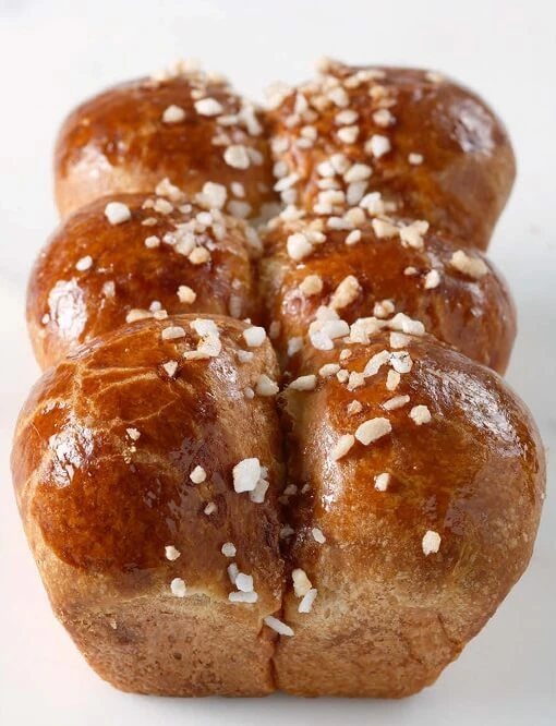 Fluffy, golden brioche made at home with professional techniques.