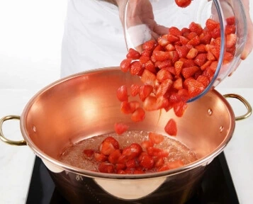 Create the ideal syrup base by combining sugar and water to bring out the full flavor of fresh strawberries.