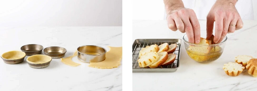 Close-up of smooth, pale yellow sweet pastry dough rolled out on a floured surface, ready to be cut into shapes.