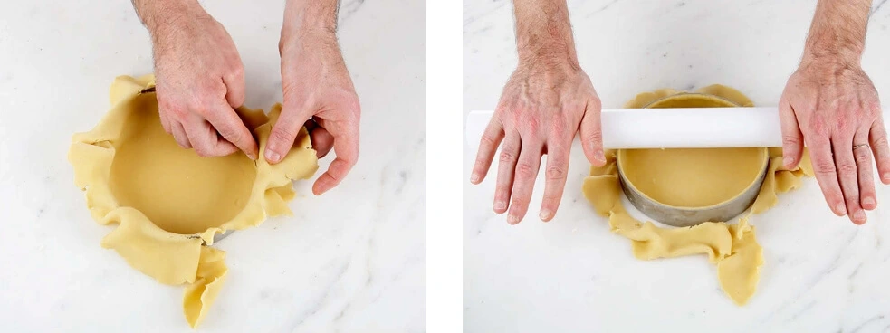 Lining the cheesecake ring with parchment paper for a smooth, easy release.